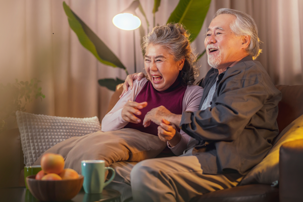 Blog couple laughing on couch 600 600 p l 97