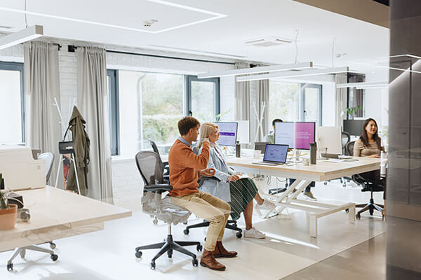 Business Technology Partners Sub Hero 600x400 Workers in an open office sitting at desks