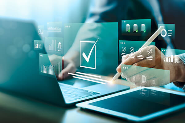 Laptop with abstract images projecting from screen