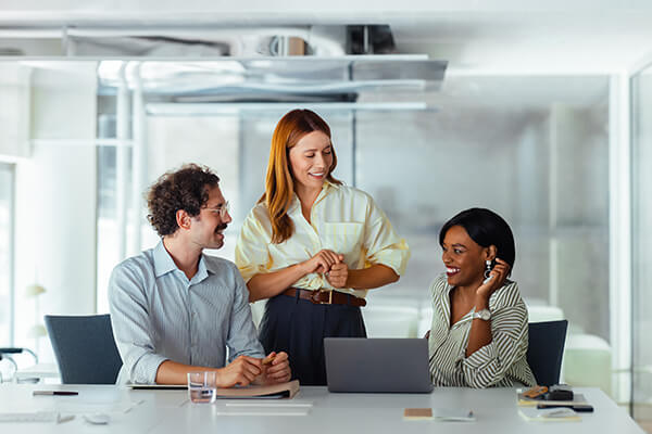 Partners Network Advantage Sub Hero 600x400 Group of 3 co-workers gathering in conference room