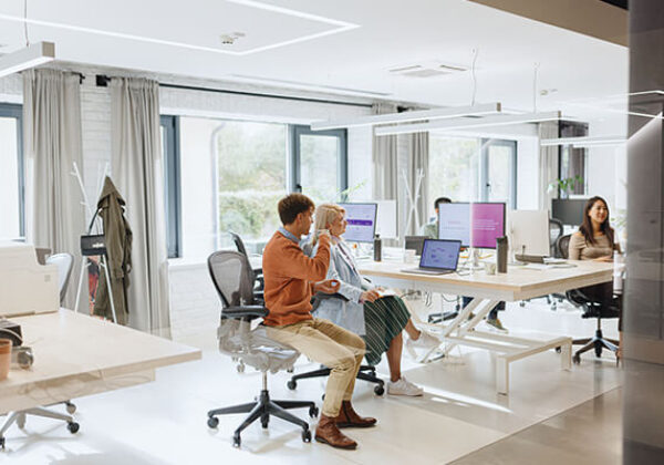 Business Technology Partners Sub Hero 600x400 Workers in an open office sitting at desks