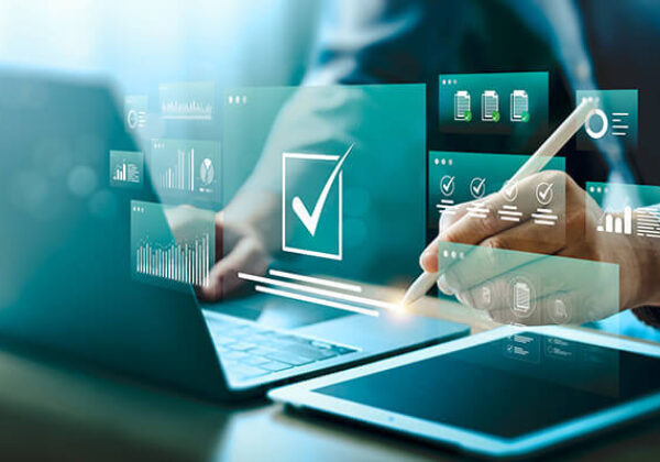 Laptop with abstract images projecting from screen