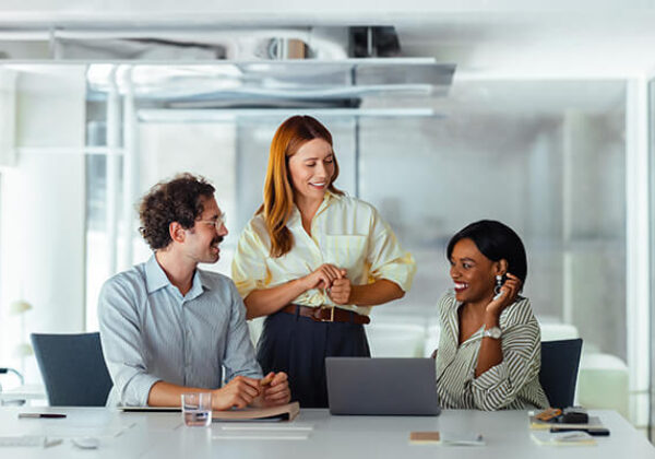 Partners Network Advantage Sub Hero 600x400 Group of 3 co-workers gathering in conference room