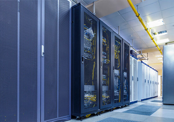 Data center room with cabinets all in a row