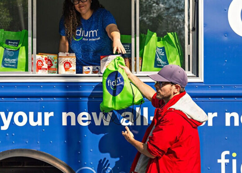 About Us Fidium Blue Truck Sub Hero 600x400 Fidium food truck handing out goodies
