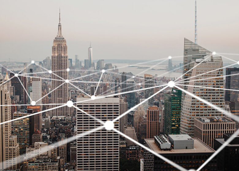 Business Business Cloud Access Sub Hero 600x400 White dots with connected lines above a city skyline