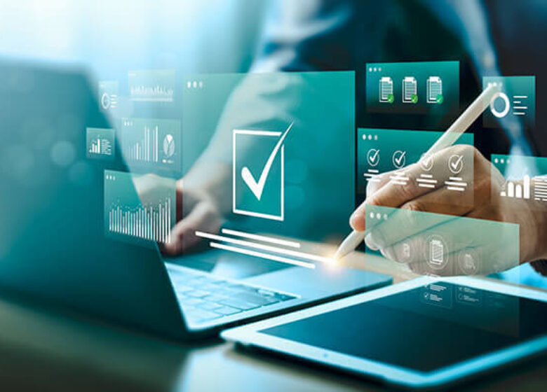 Laptop with abstract images projecting from screen