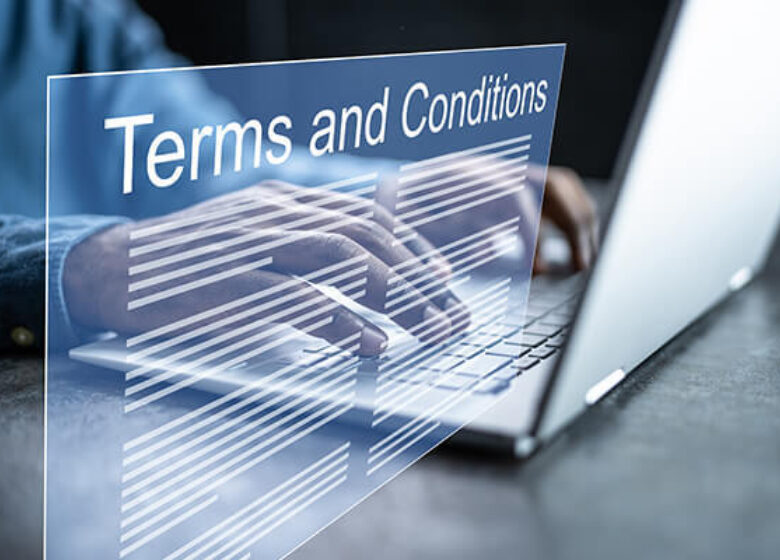 3-D of Terms and Conditions coming from computer screen