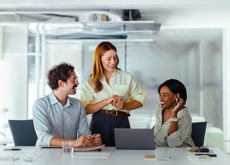 Partners Network Advantage Sub Hero 600x400 Group of 3 co-workers gathering in conference room