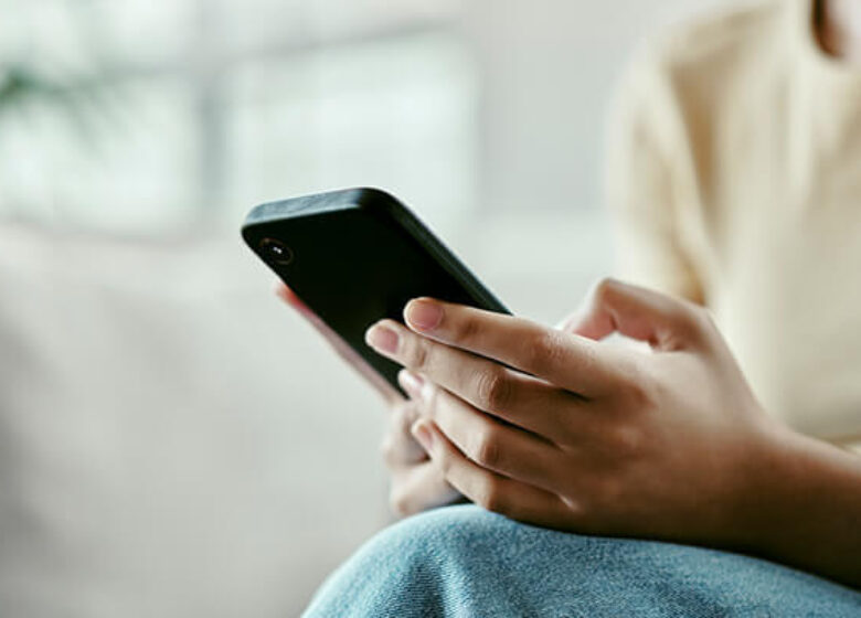 Person looking at mobile phone