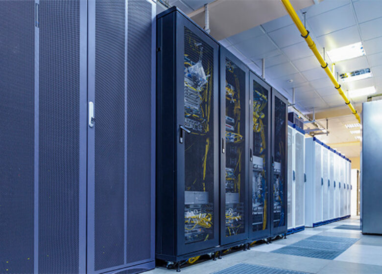 Data center room with cabinets all in a row